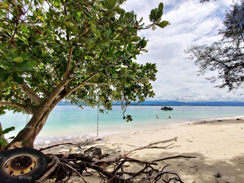 “At the beach, life is different. Time doesn’t move hour to hour but mood to moment. We live by the currents, plan by the tides and follow the sun. “