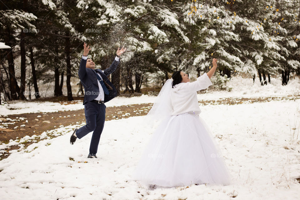 Cute couple playing in winter