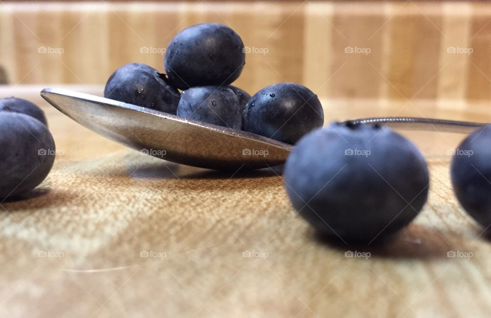 Blueberries on a spoon