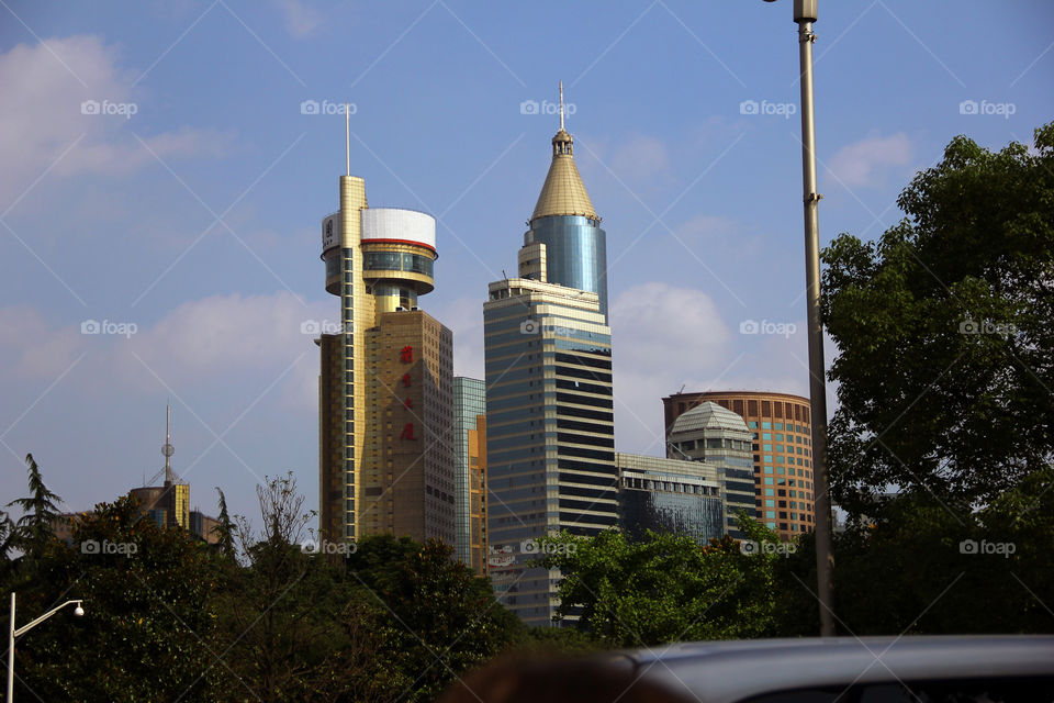 Weird buildings in Shanghai.. Some skyscrapers get weird shapes, like these in Shanghai, China.