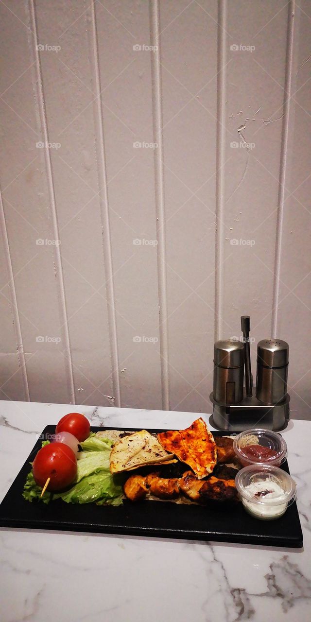 Meat meal with salads