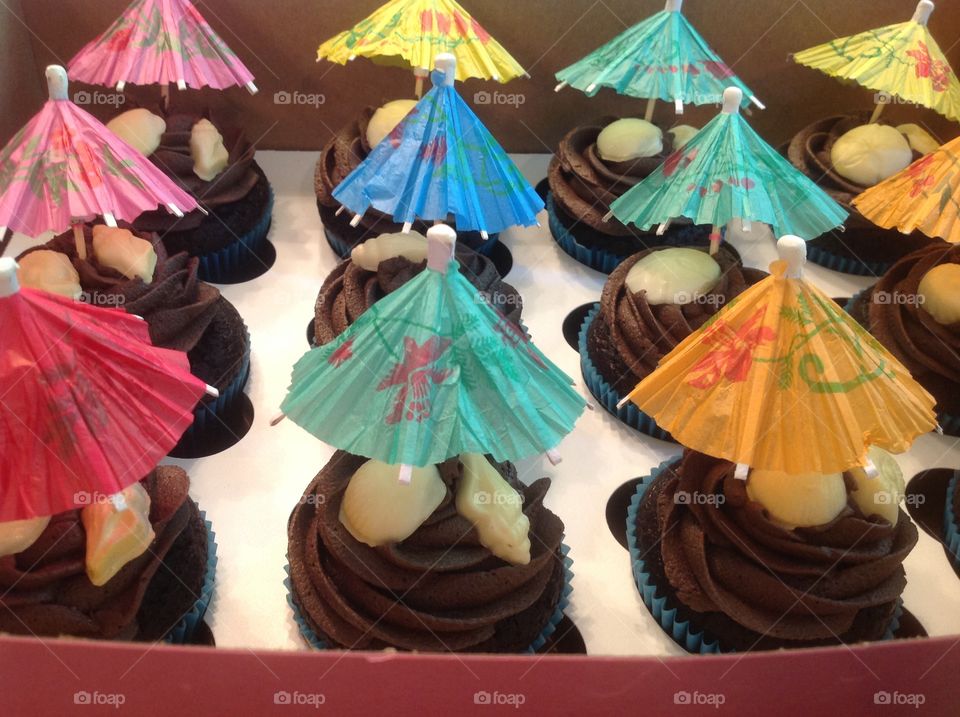 Beautiful beach theme cupcakes chocolate seashells.