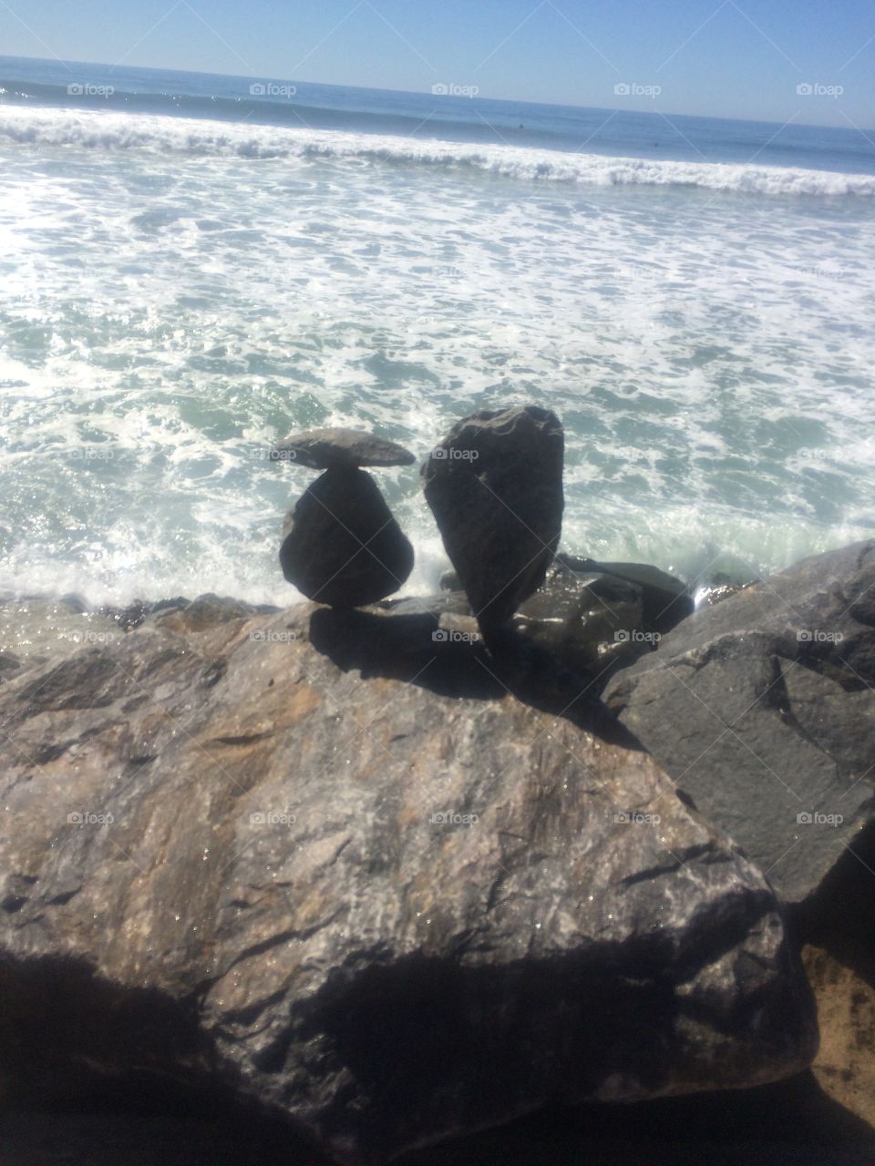 Balanced rocks on beach and coast of San Diego, CA