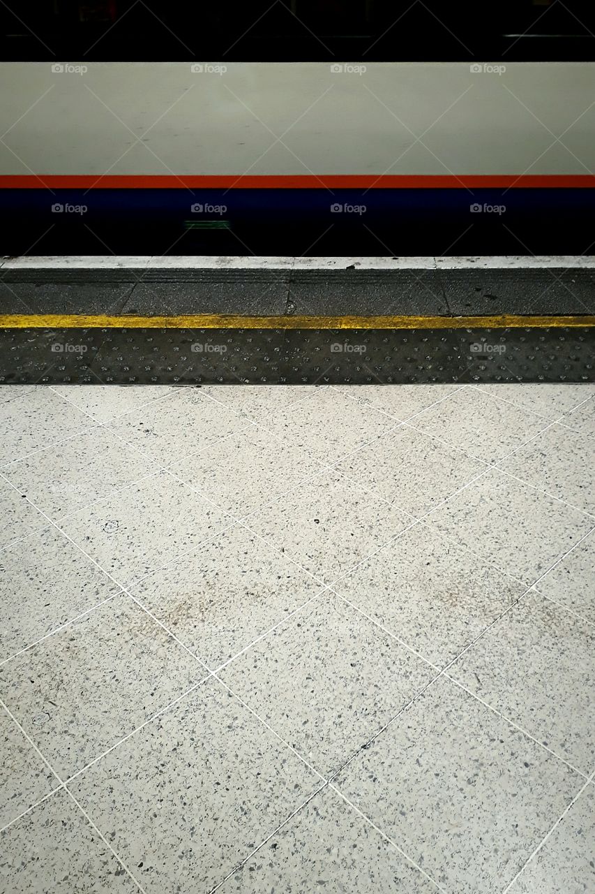 overground train entering the platform - London, UK