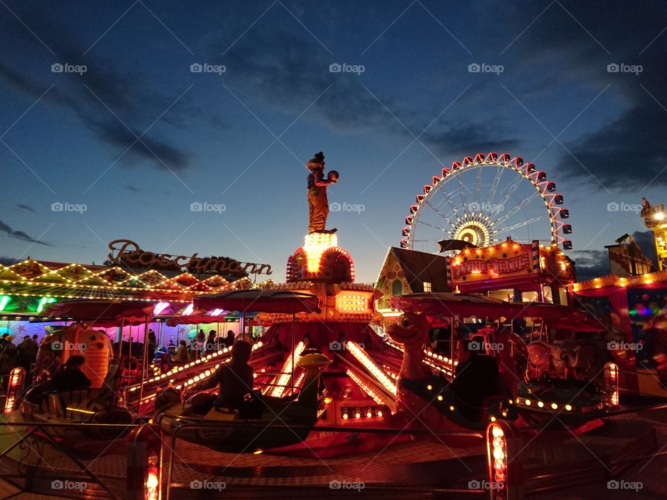 colourful Oktoberfest in Stuttgart, Germany. view on children's attractions.