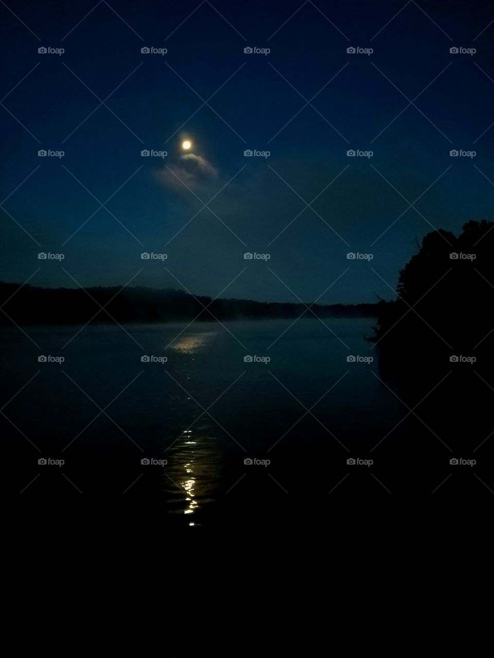 morning moon over lake.