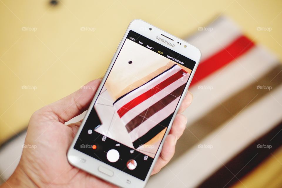 home cleaning with samsung smartphone