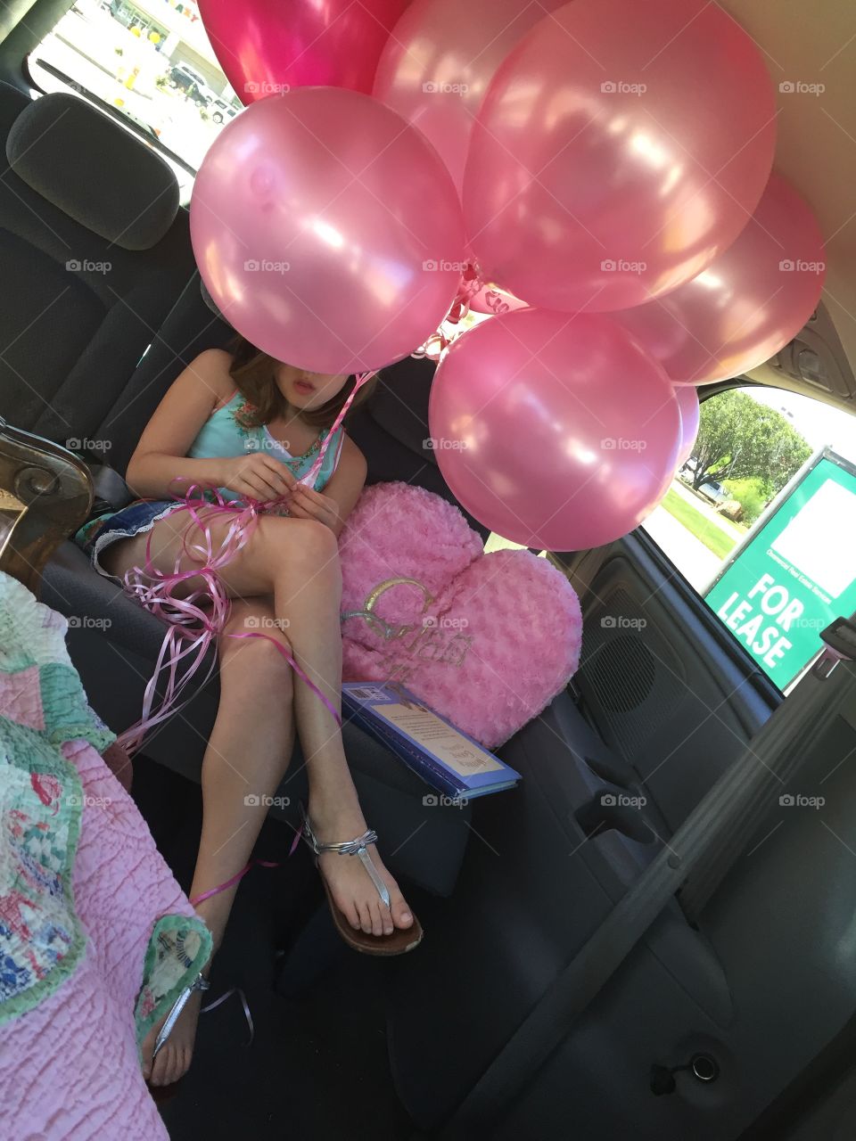 Pink balloons and Young Girl