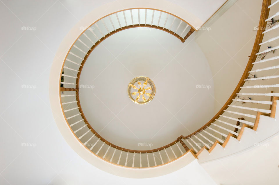 Looking up from below a spiral staircase