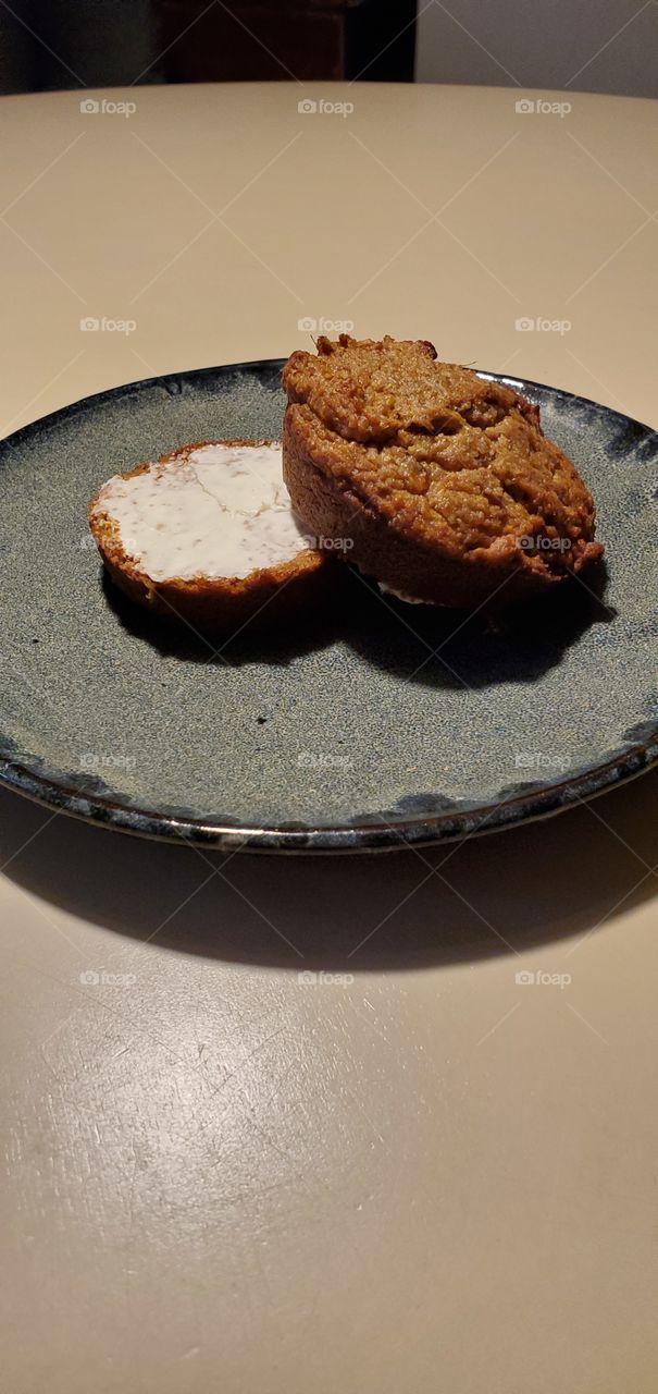 Sweet Potato Muffin, cut & buttered; time to eat! 🍽 Muffins with no preservatives! Serving plate is hand made gray color.