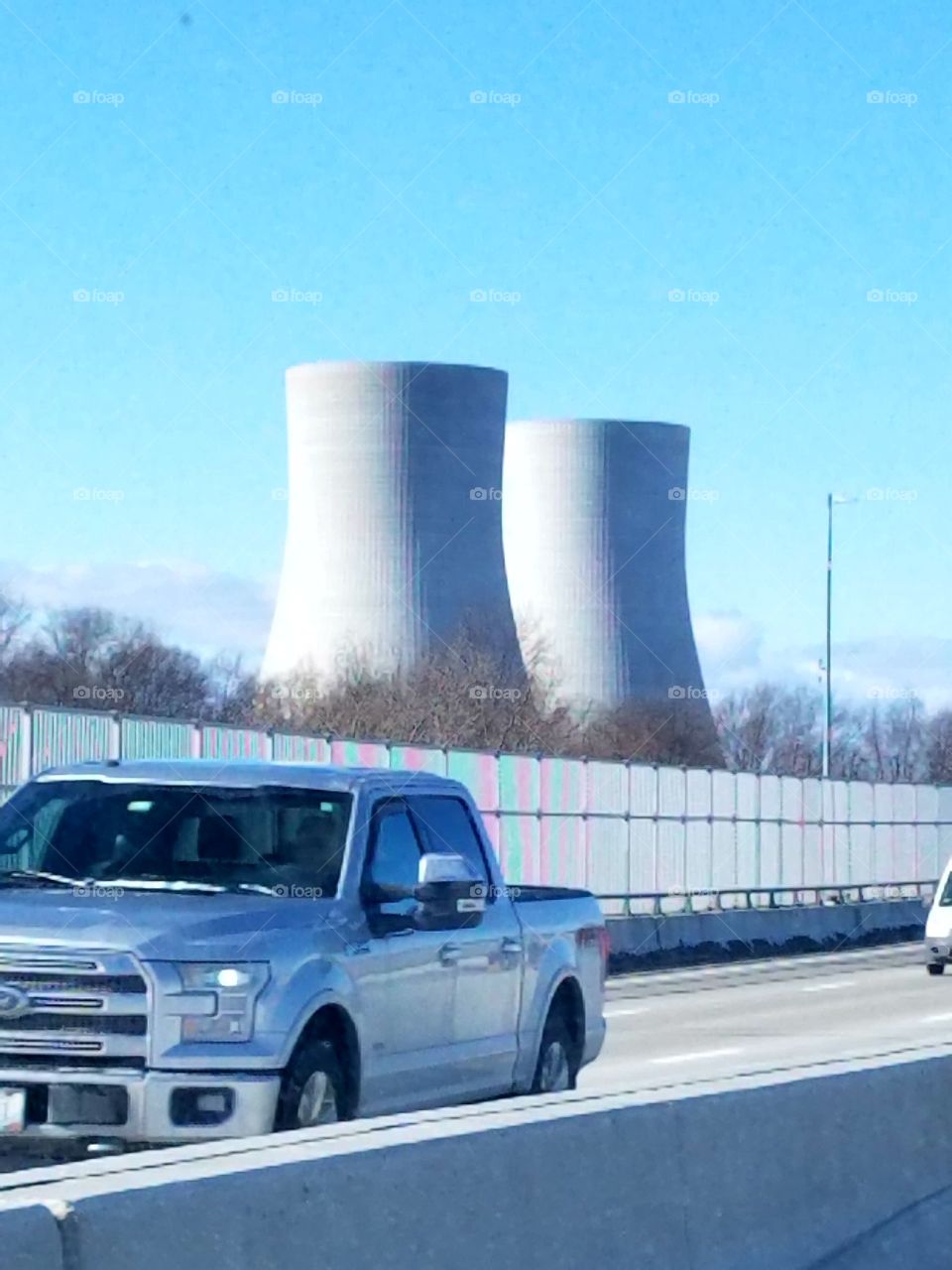 Nuclear power plant two Cooling Towers as seen from highway.