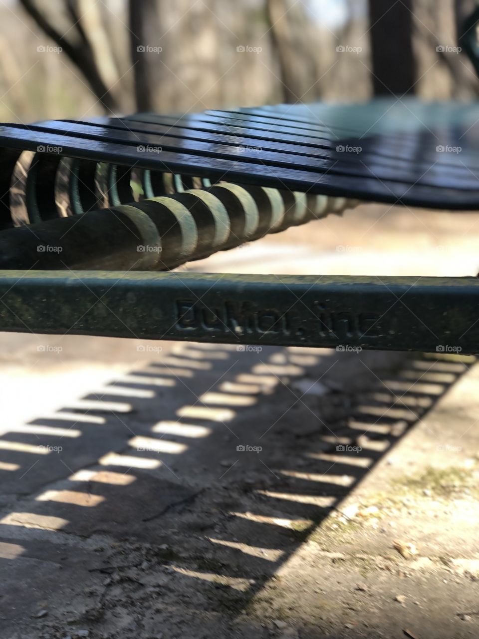 Green metal park bench 