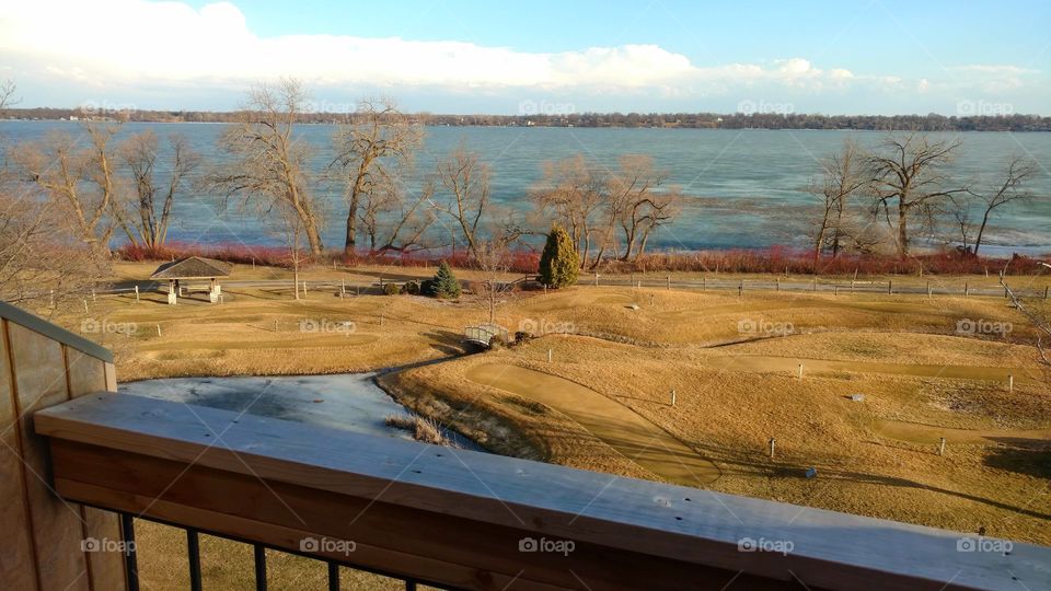 view of pond and Golf Course over frozen lake Minnesota