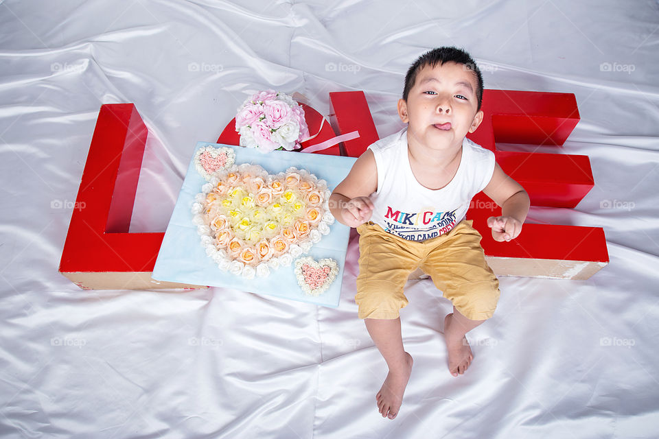 Portrait of Asian boy teasing