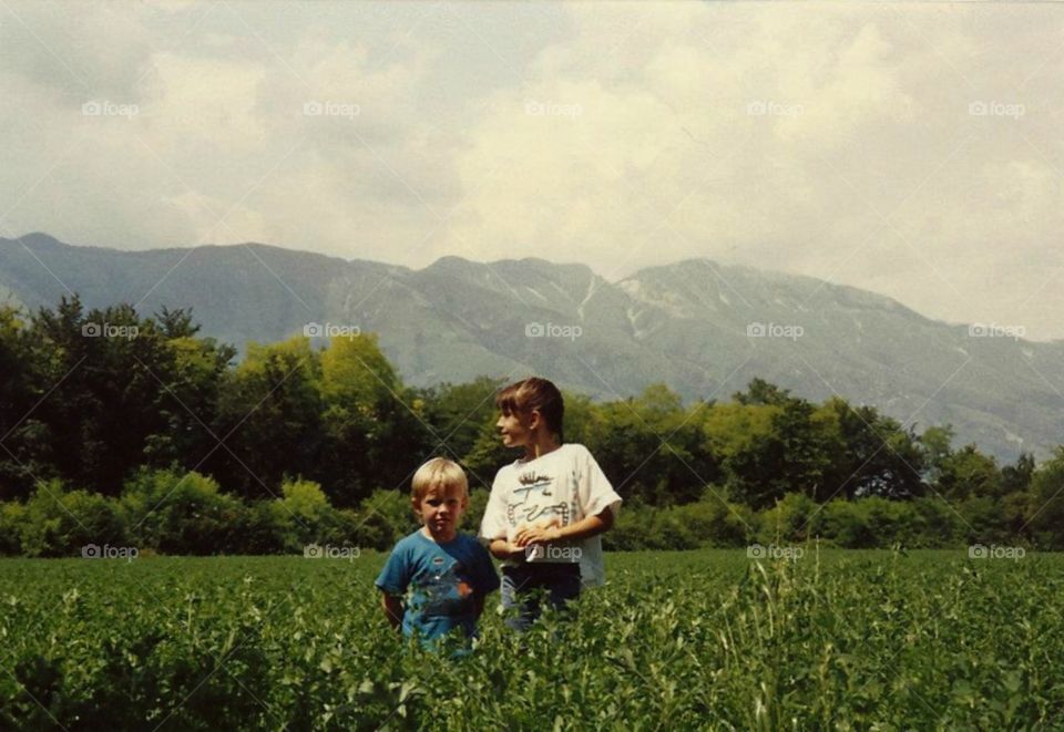 child tourists in alps