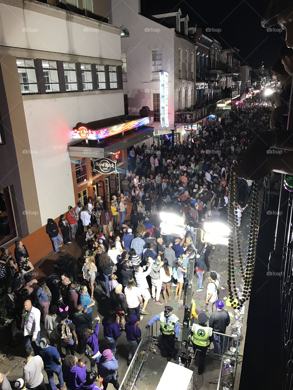 The Bourbon Street crowds during Mardi Gras. View from Bourbon and Iberville.