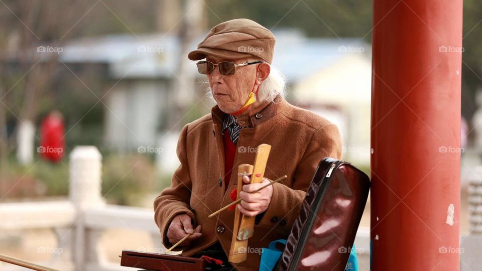 Old grandfather in the park 