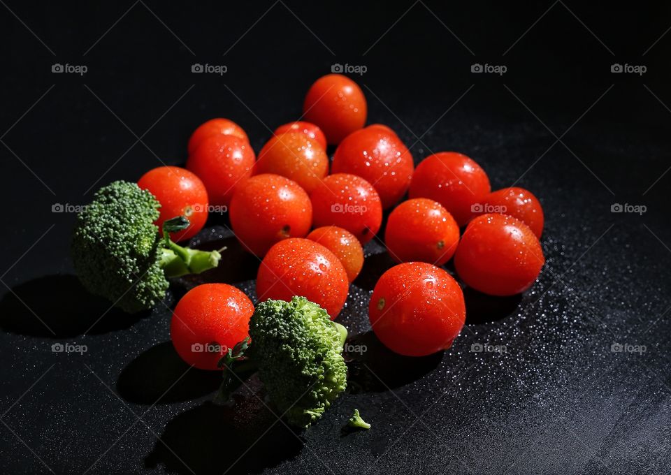 Still life of tomatoes and broccoli