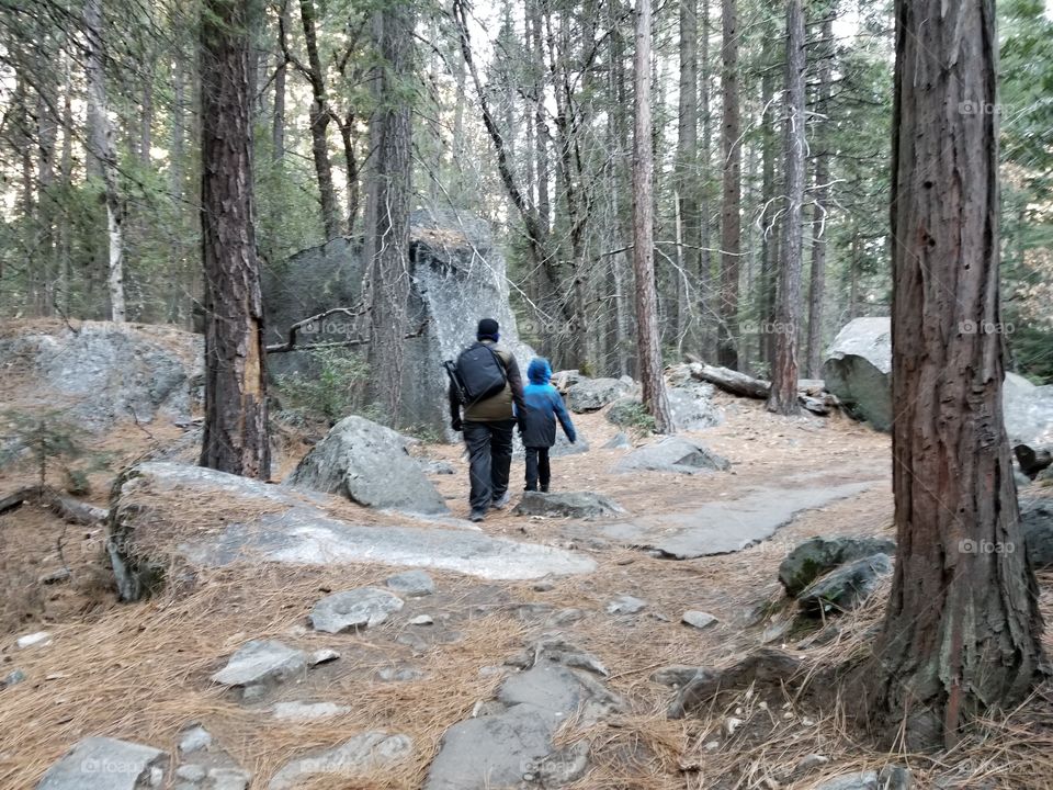 Father and son bonding over a hike