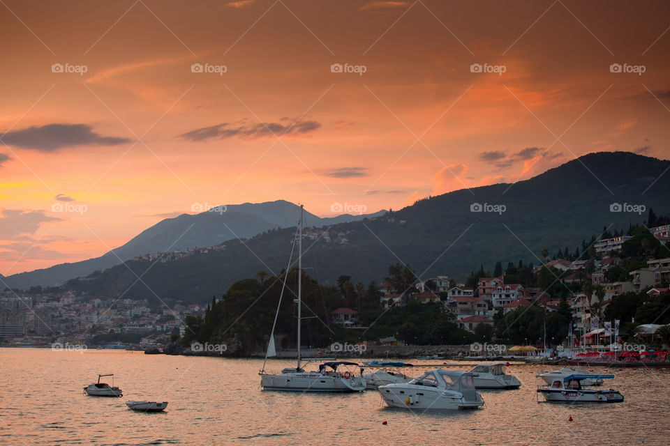 Yachts in Boko Kotor bay at Sunset. Herceg Novi, Montenegro