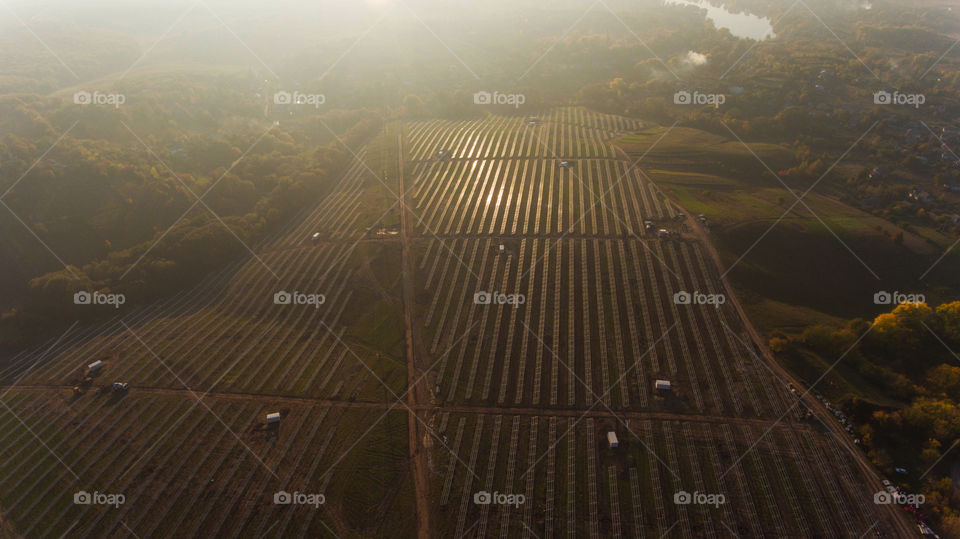 Solar power station from above. Sunset 