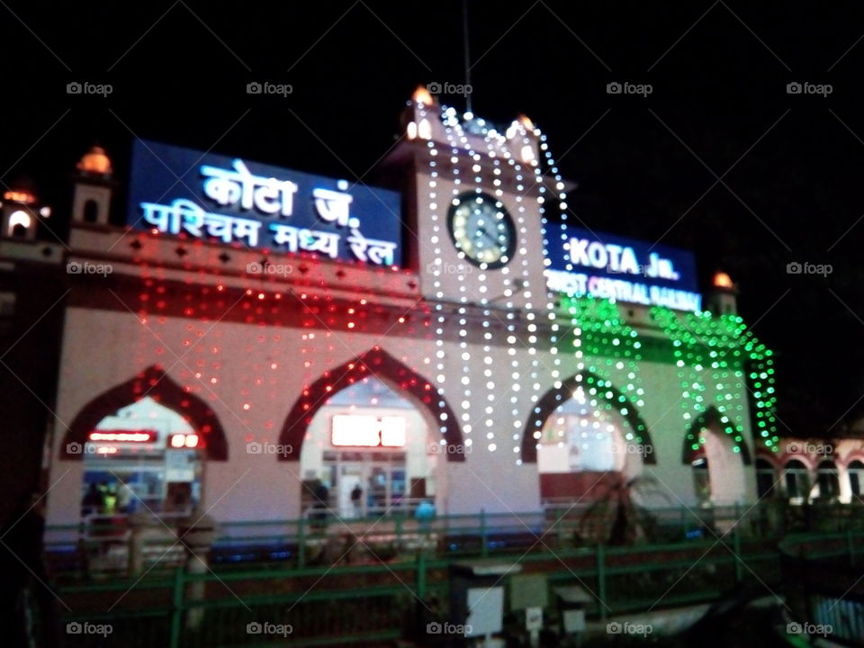 Illuminated railway station at night