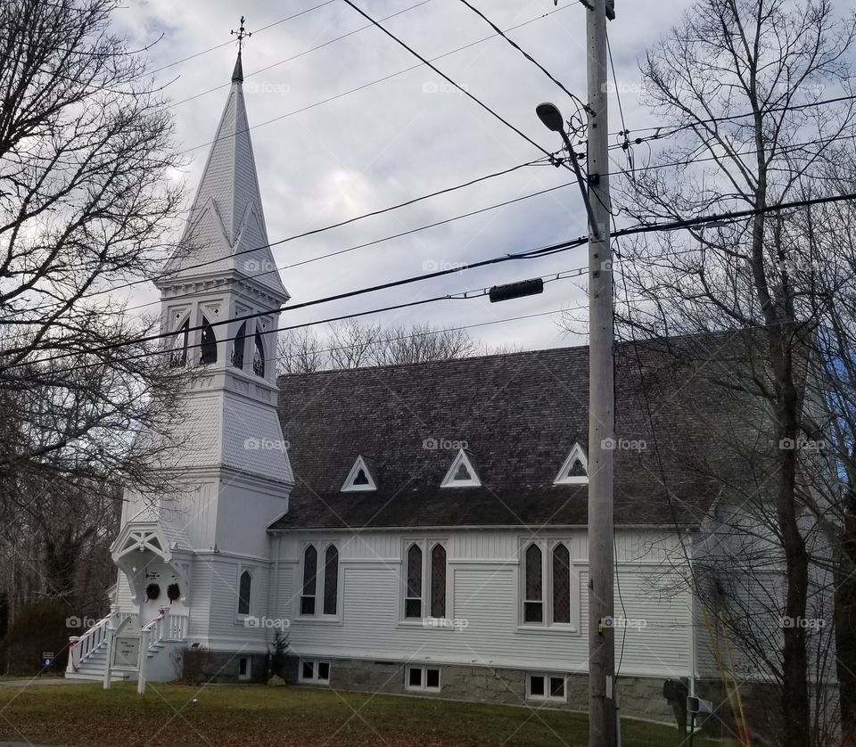 New England church architecture. Located on the Old Kings Highway, also known as Route 6a in Yarmouthport, this historic building sets along the very trek of Thoreau.  It is steeped in history and exudes architectural interest with the varying shapes, and lines in it's construct.