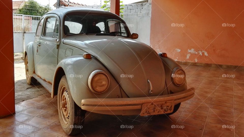 The old car in Brazil. Old Volkswagen with local name Fusca. Very old but very cool. Still alive. Old spirit.