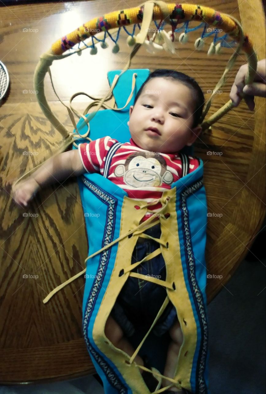 baby in Native American Headboard