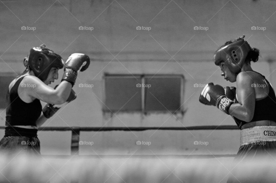 Women's boxing fight. Contemplating the competition.