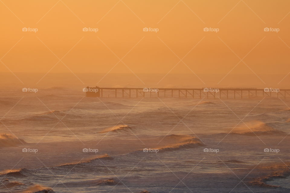 Steetley Pier at dawn large waves