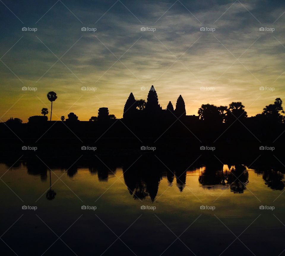 Angkor way temple sunrise reflection
