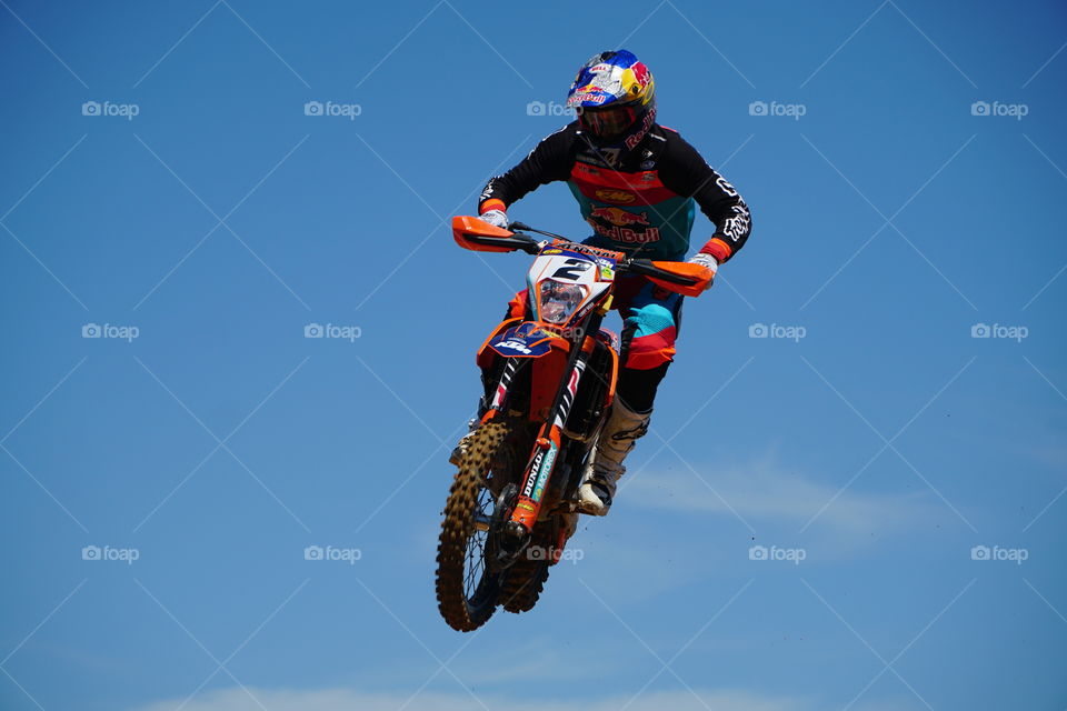 Motorcycle rider jumping