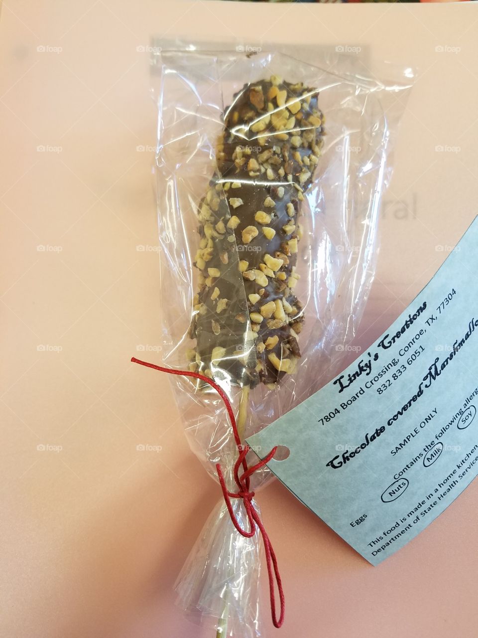 Chocolate and peanut covered marshmallows