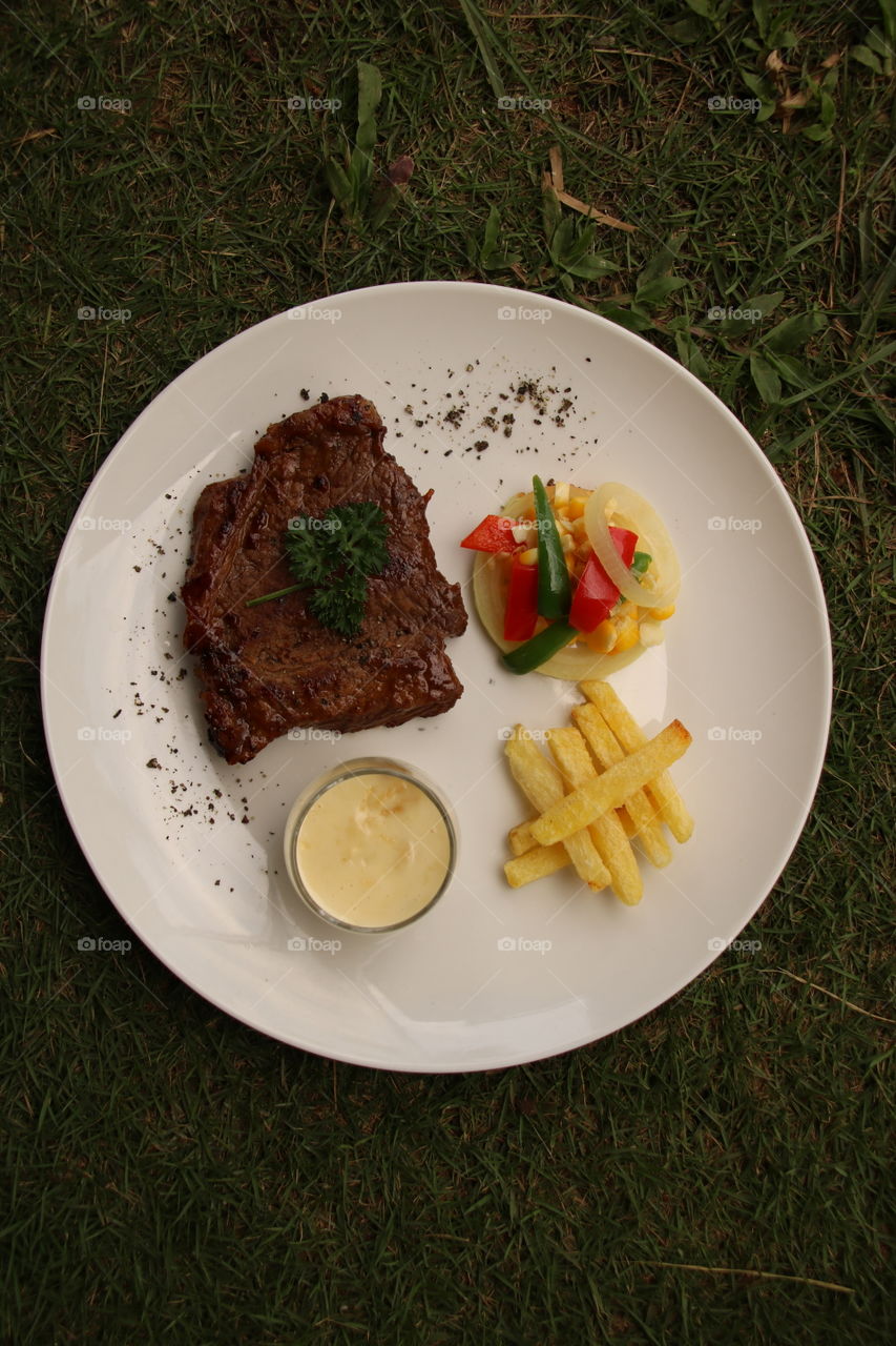 black pepper beef steak with cheese sauce