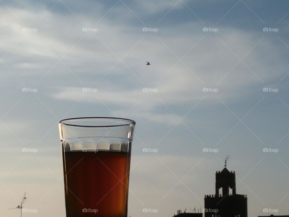 Beautiful cup of tea and magic minaret mosque.