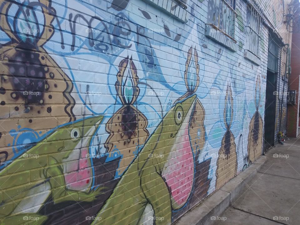 Green Anole Lizards Native to Florida Painted on Brick Mural Jacksonville FL.