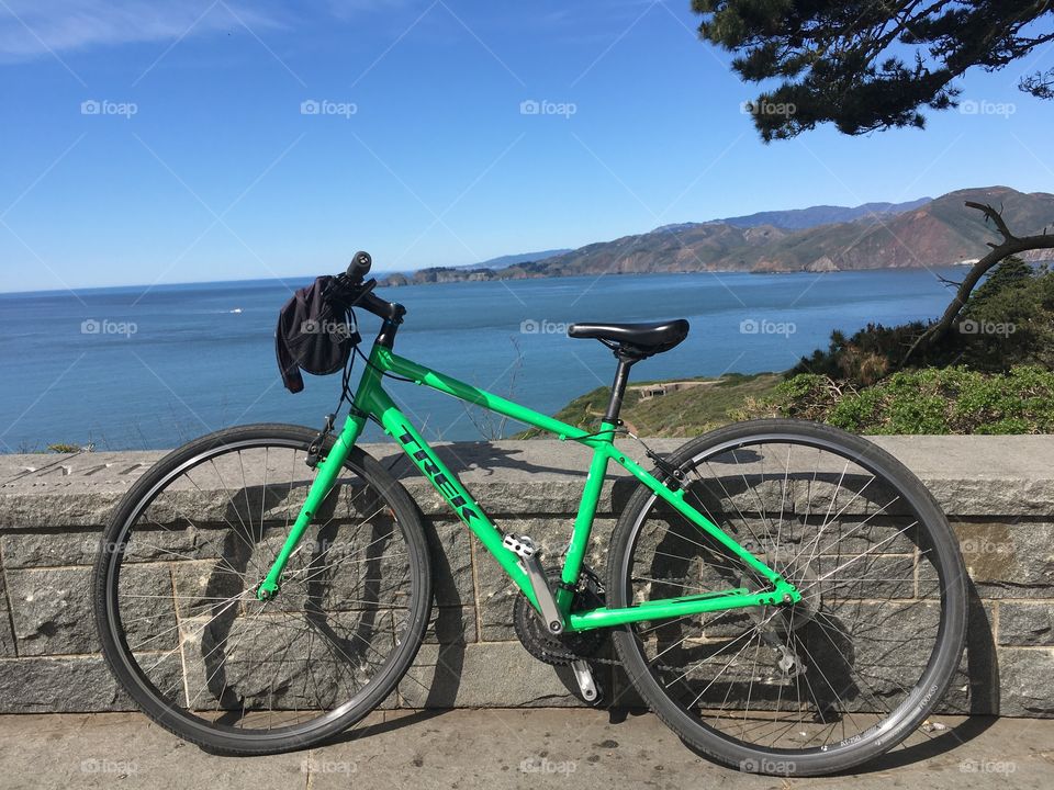Green bike on the sunny San Francisco Bay 