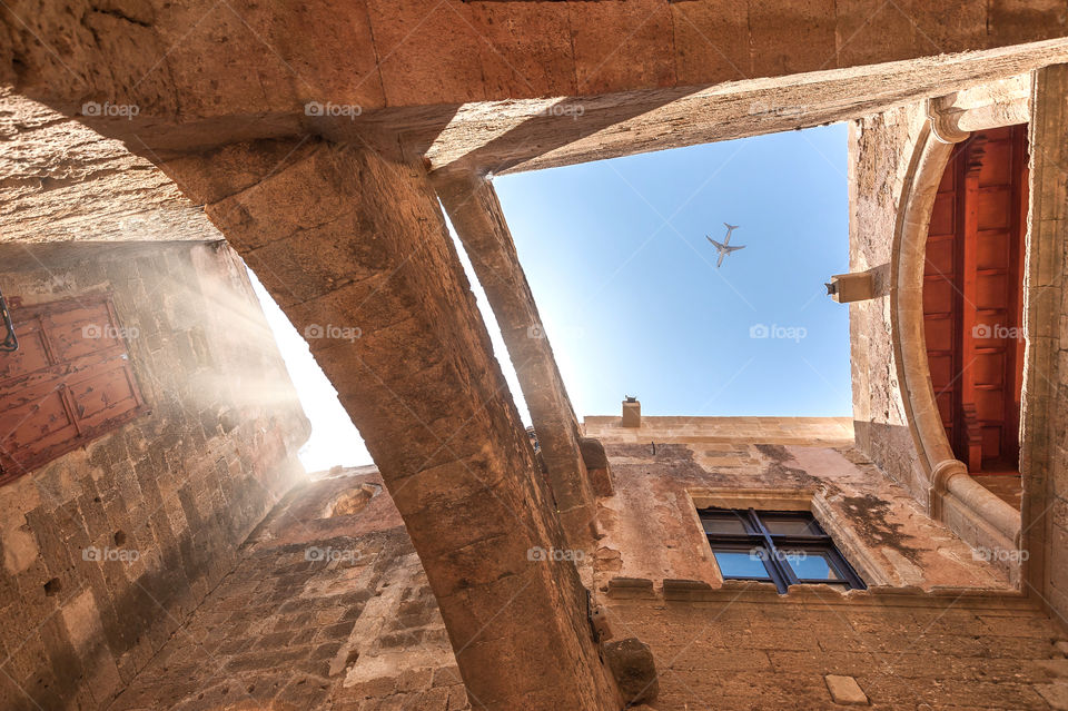 Old medieval masonry building in Rhodes downtown. Island of Rhodes. Greece. Europe.