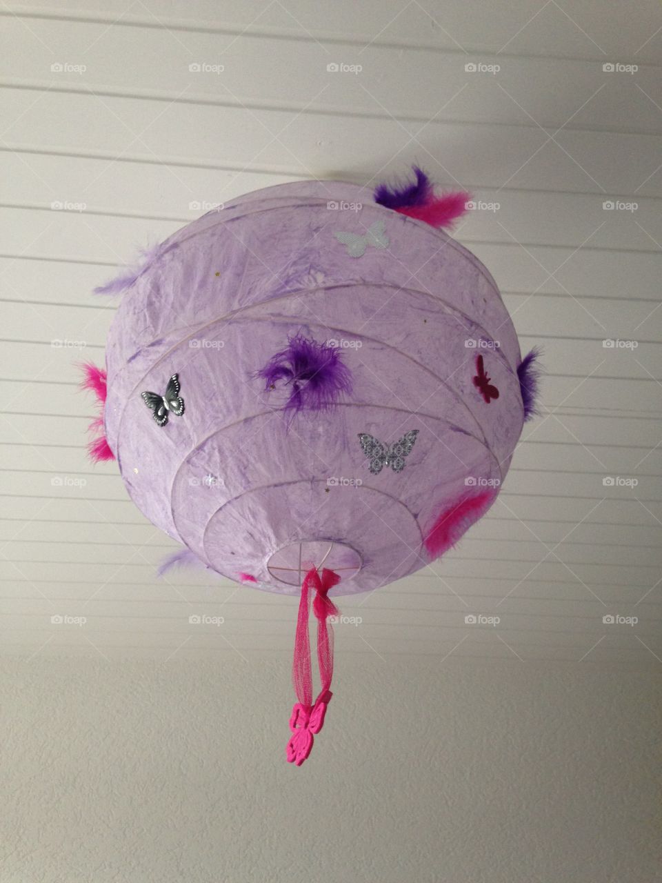 Chinese ball decorated with butterflies and purple