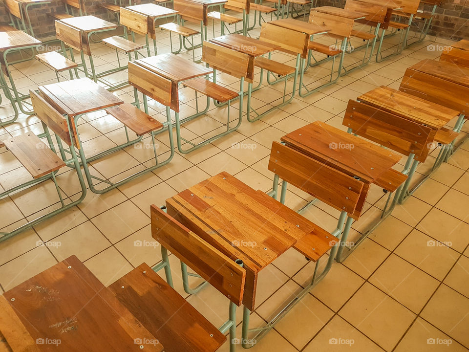Class full of empty school benches