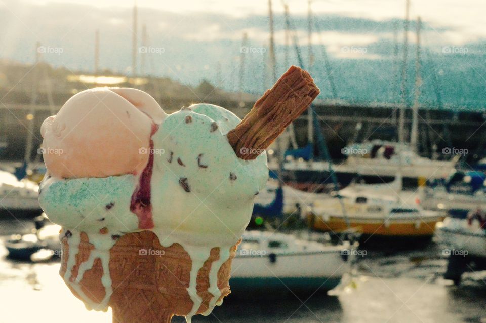 Hand holding ice cream 