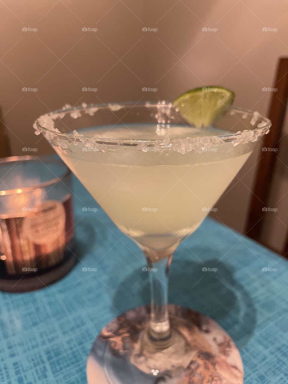 Zoomed in Margarita on a calm evening with candle lit in background