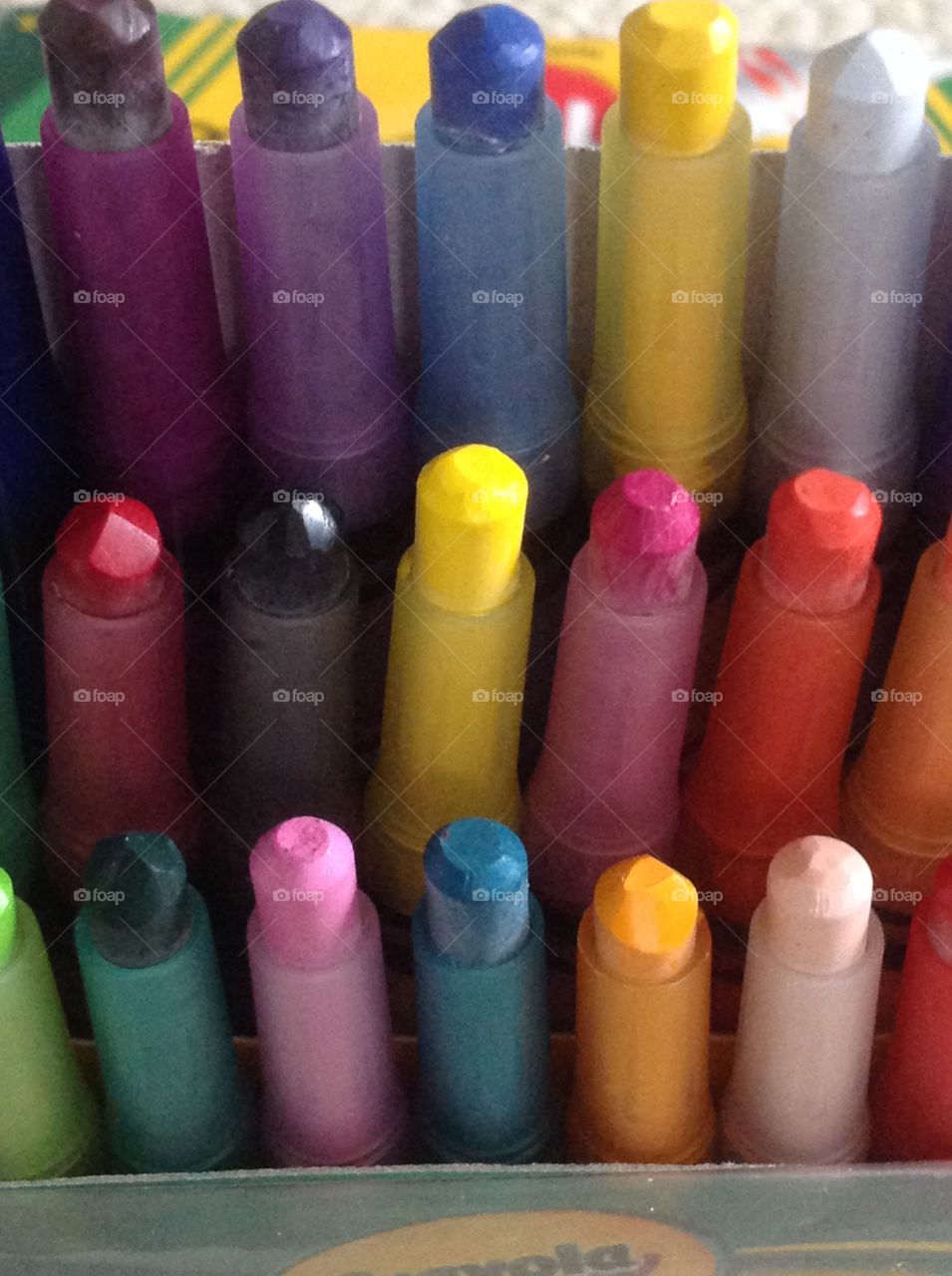 Different colored crayons for arts and crafts supplies. 