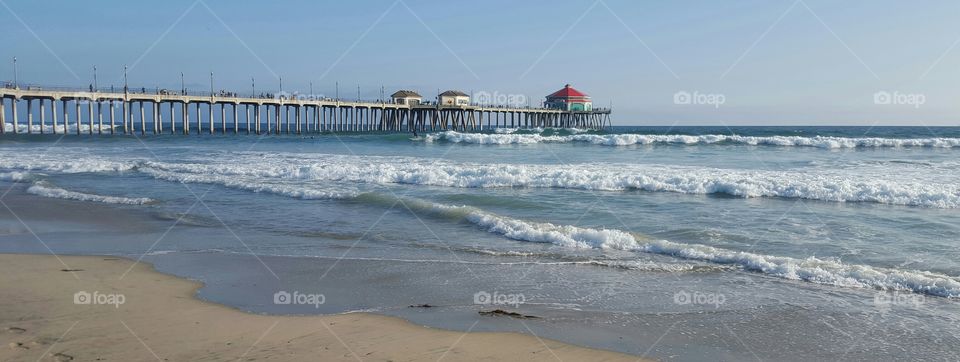Huntington Beach Pier in the afternoon. June at Huntington Beach California