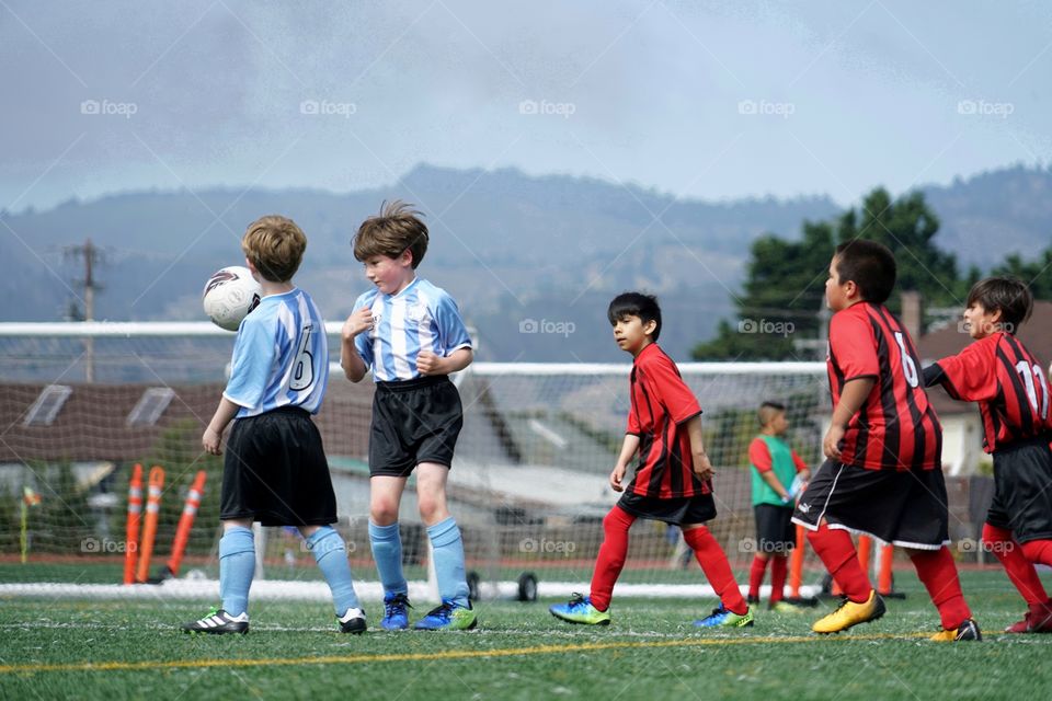 Young Boys Playing Soccer