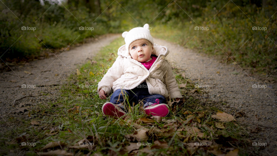 Baby sitting on grass