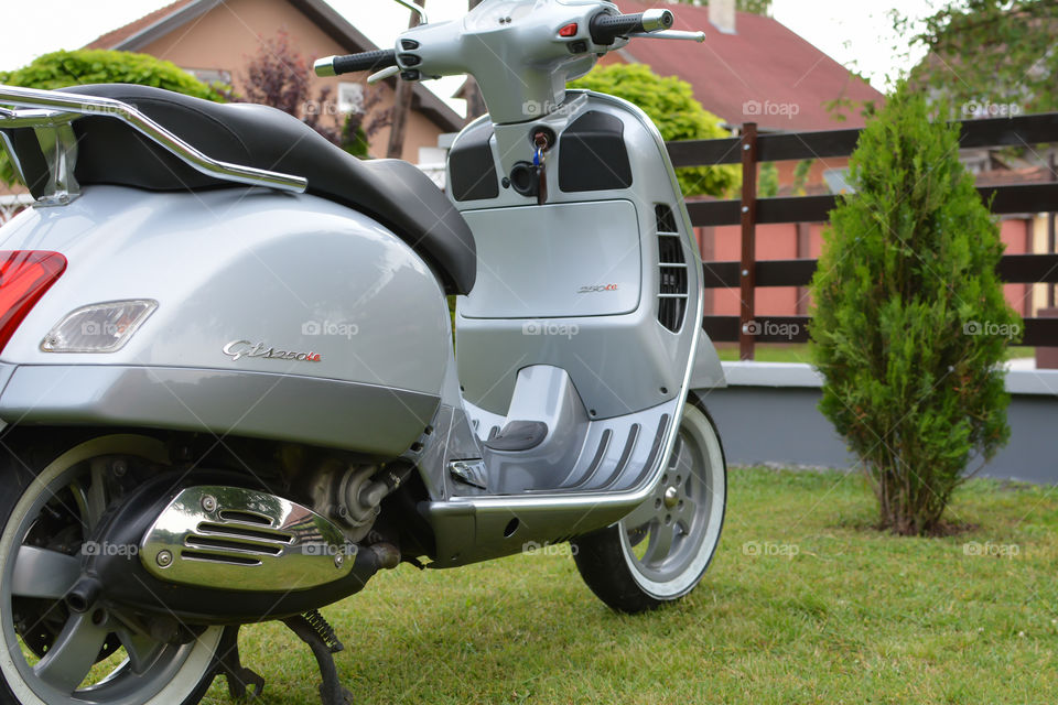 grey vespa motorcycle, italian style