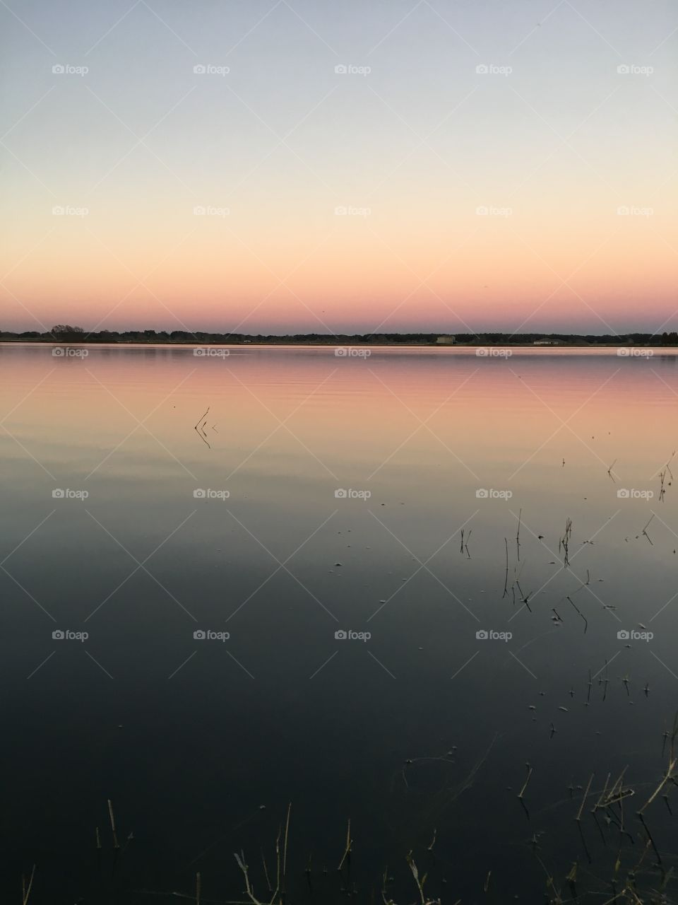 Mirror mirror on the lake who's the prettiest sunset of all?