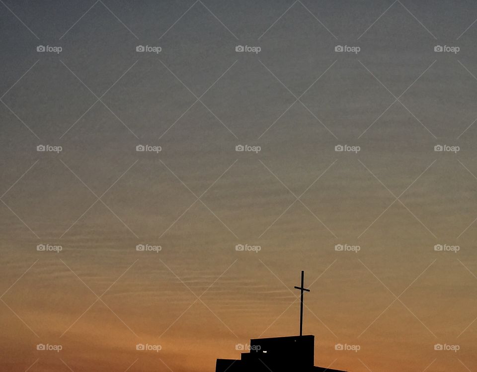 Sunset over a cross